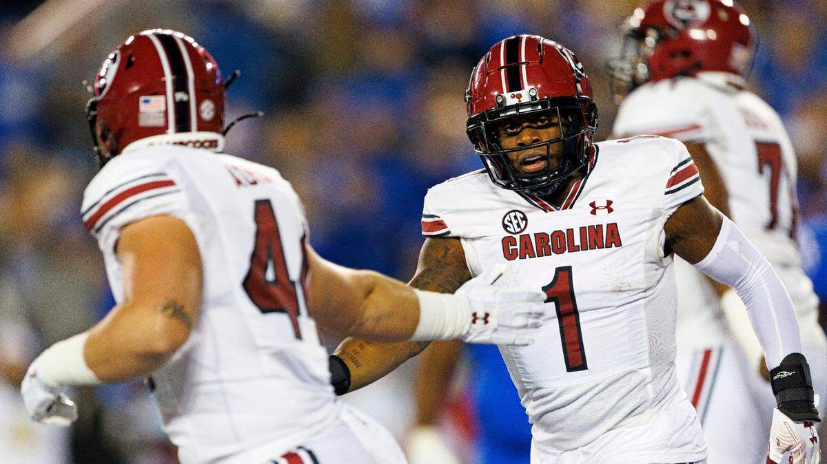 South Carolina running back MarShawn Lloyd (1) celebrates with tight end Nate Adkins (44) after Lloyd’s touchdown against Kentucky during the first half of an NCAA college football game in Lexington, Ky., Saturday, Oct. 8, 2022. (AP Photo/Michael Clubb)