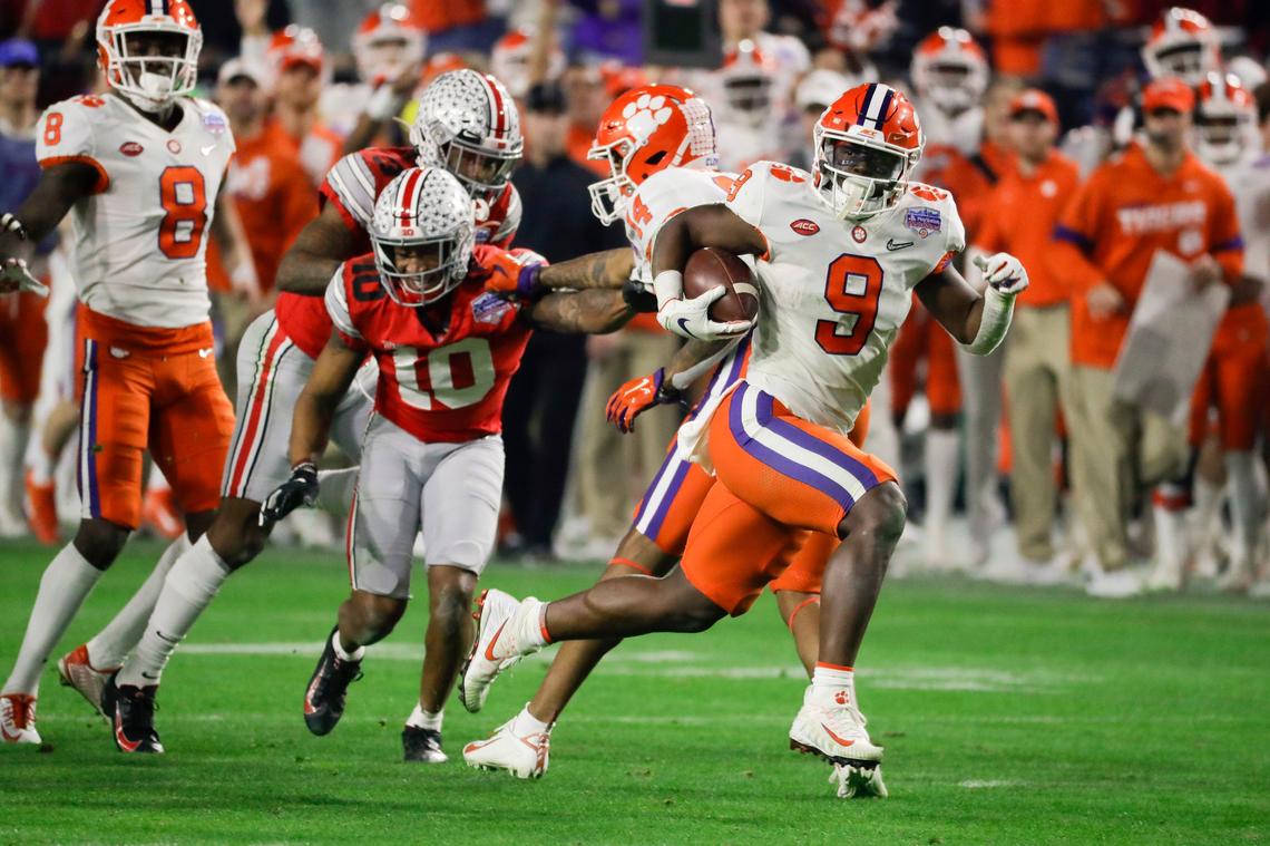 Clemson running back Travis Etienne runs for a touchdown against Ohio State during the second half of the Fiesta Bowl NCAA college football playoff semifinal Saturday, Dec. 28, 2019, in Glendale, Ariz.