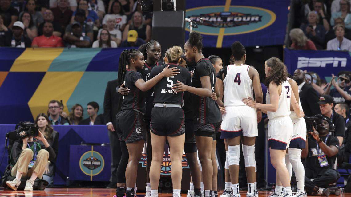The Gamecocks and Huskies huddle during the second half of action of their women's basketball game in the NCAA Tournament semifinals at Mortgage Matchup Center in Phoenix on Friday, April 3, 2026.