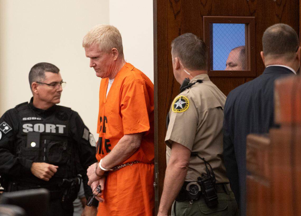 Alex Murdaugh enters the courtroom during the sentencing for his financial crimes in the Beaufort County Courthouse on Tuesday, Nov. 28, 2023. Andrew J. Whitaker/The Post and Courier/Pool