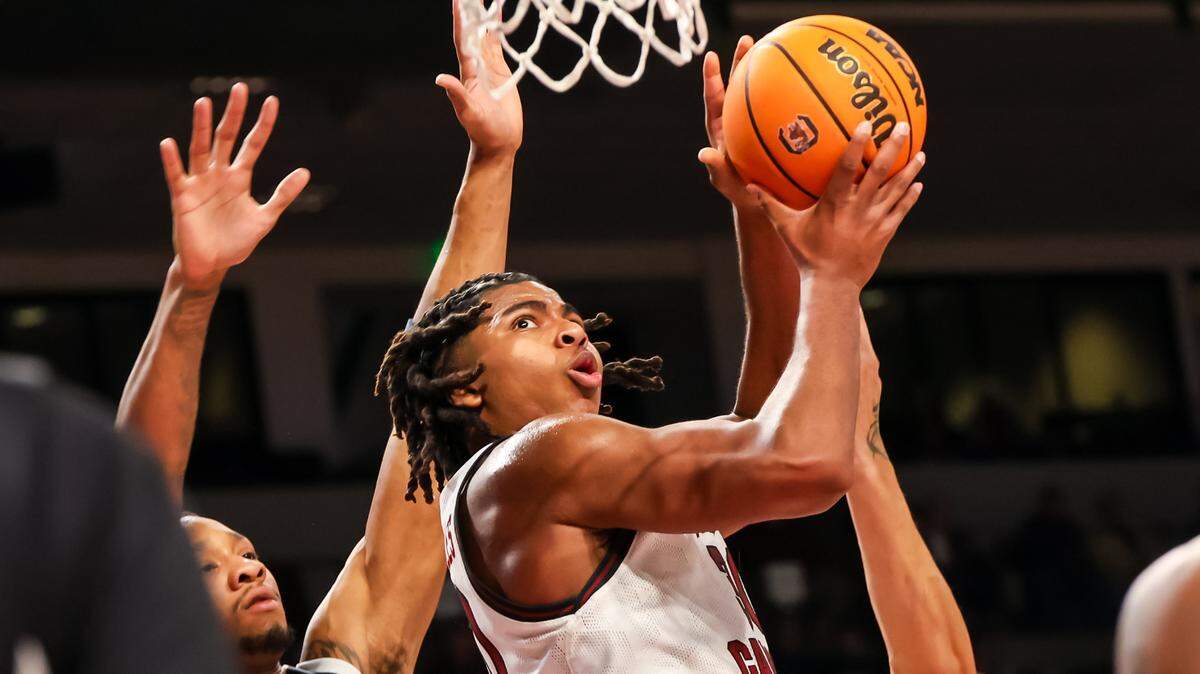 South Carolina Gamecocks forward Collin Murray-Boyles (30) drives past Radford Highlanders forward Isaiah Gaines (6) in the first half at Colonial Life Arena.