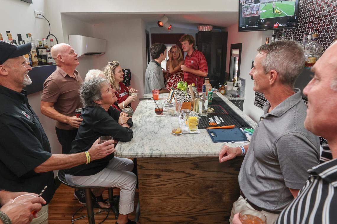 A group gathers inside a Cockaboose before the USC game against LSU on Saturday, Sept. 14, 2024.