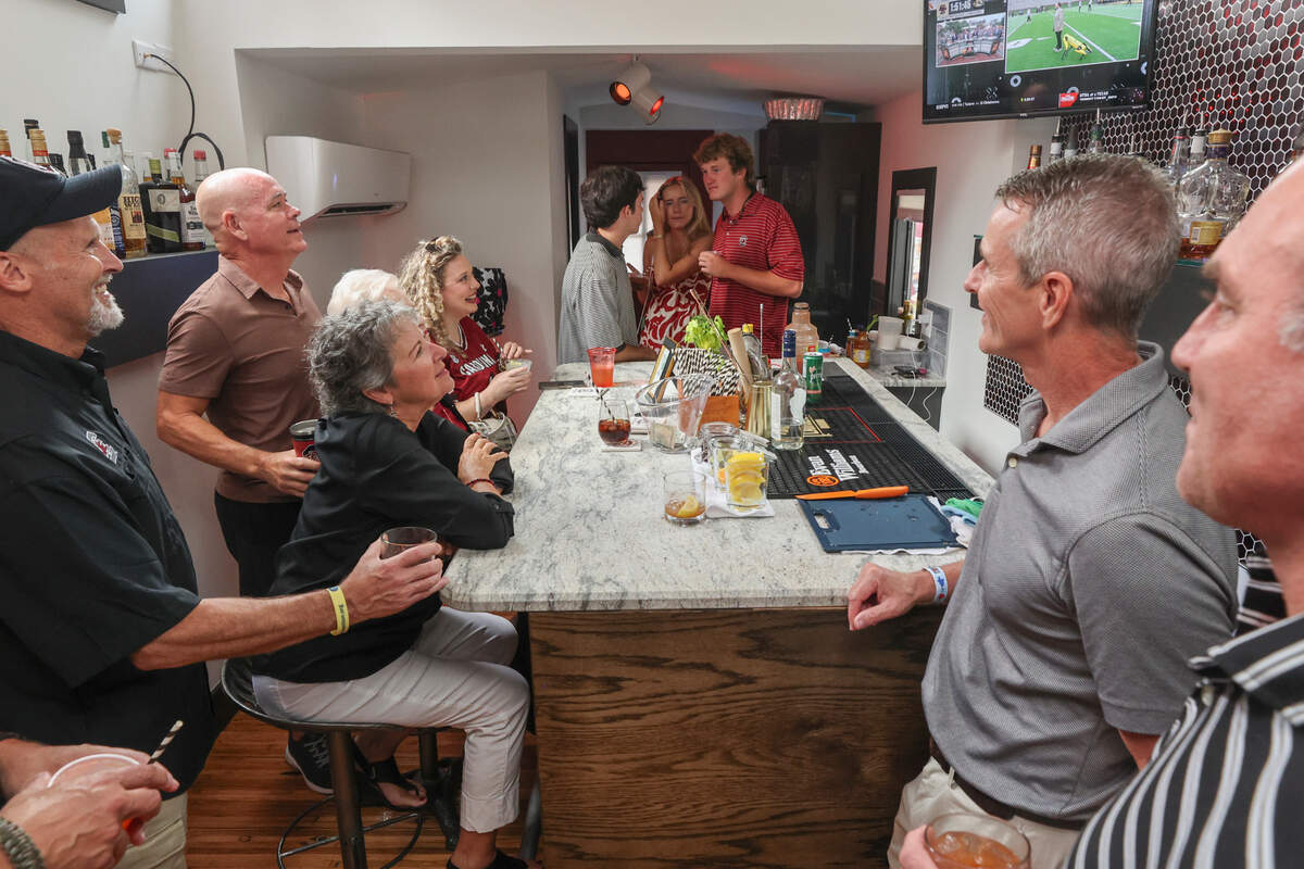 A group gathers inside a Cockaboose before the USC game against LSU on Saturday, Sept. 14, 2024.