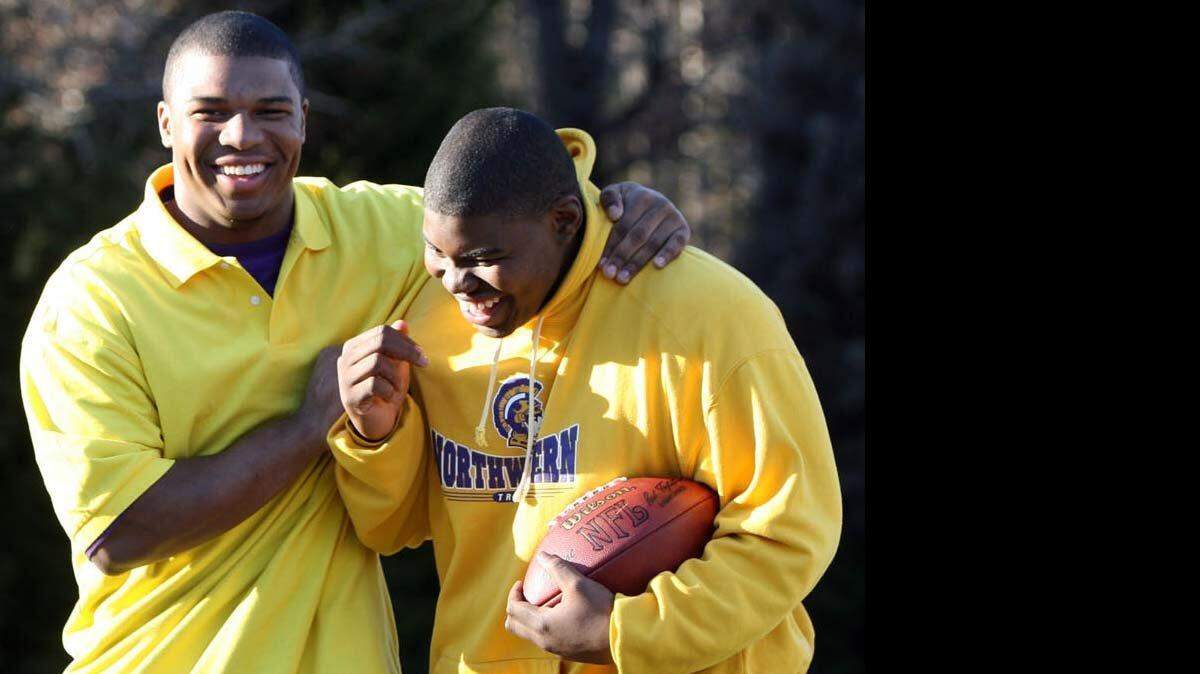 2/18/10 Rock Hill, SC:  Football brothers Gerald Dixon of South Pointe, left, and Gerald Dixon of Northwestern, are the sons of former USC star linebacker Gerald Dixon, who is an assistant coach at Rock Hill High. Northwestern's Dixon is the oldest of the brothers by about six months. While they currently play for opposing teams and have done so since middle school. they enjoyed the days they shared the same team colors for a Pee Wee football team and hope to have an opportunity to play together again when recruiters come knocking. The Dixon brothers want to go to the same school and both have talked to USC where they may be able to follow in their father's tradition.