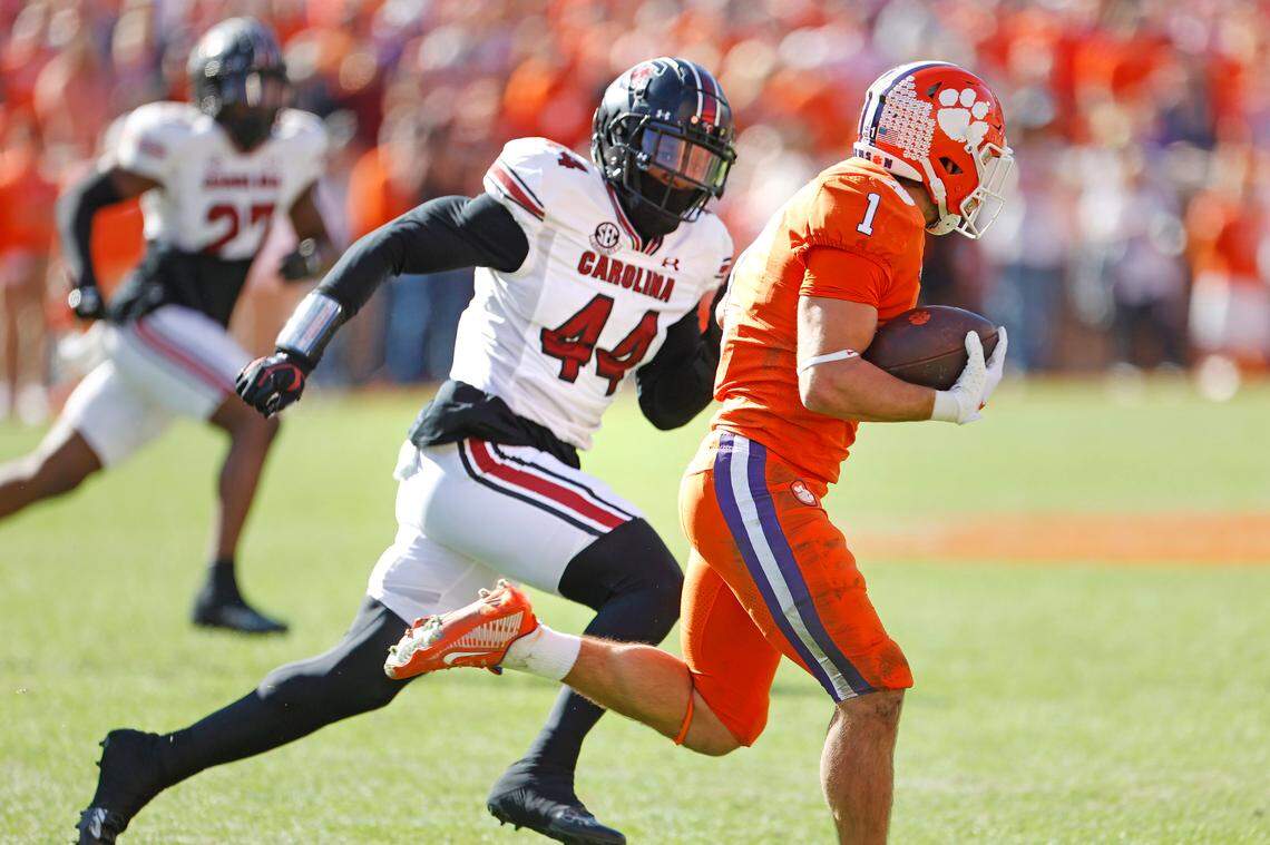 South Carolina Gamecocks linebacker Sherrod Greene (44) chases Clemson Tigers running back Will Shipley (1) on Saturday, November 26, 2022.