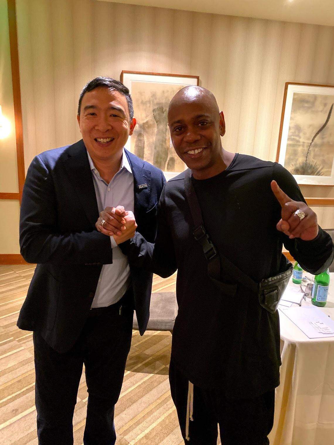 Democratic presidential candidate Andrew Yang, left, has been endorsed by comedian Dave Chappelle, who will perform in Columbia on Jan. 29.