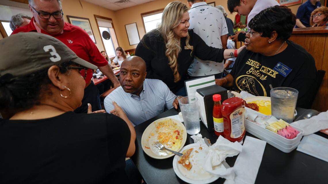Tim Scott speaks with Shirley Martin and LaVone Holbert during a campaign stop at Alex’s Restaurant in Goose Creek on Friday April 14, 2023. Scott was accompanied by Goose Creek mayor Greg Habib and council member Melissa Enos.