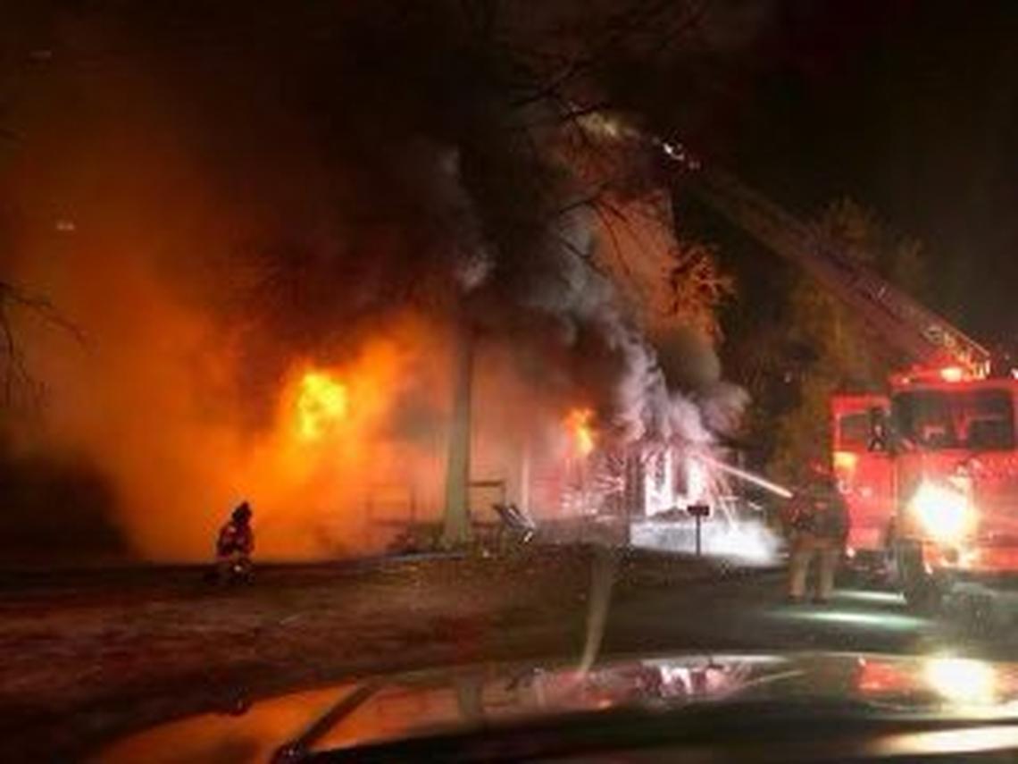 Fire fighters battle a burning building in Lexington County.