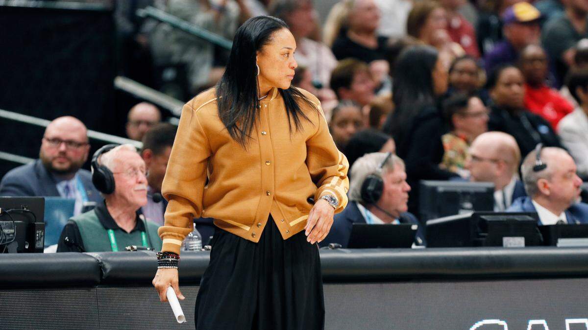 South Carolina Gamecocks head coach Dawn Staley watches her team play Iowa in the NCAA Tournament Final Four game at the American Airline Center on Friday, March 31, 2023.