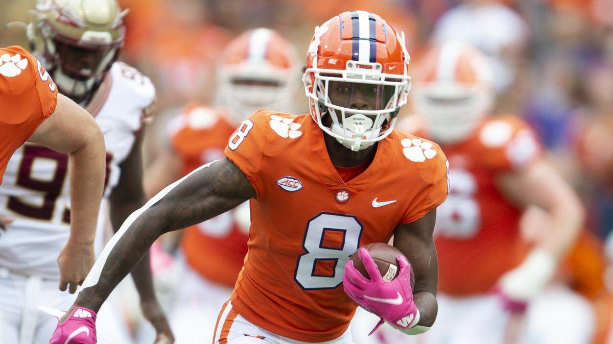 Clemson wide receiver Justyn Ross (8) runs after receiving a catch during the first half of an NCAA college football game against Florida State, Saturday, Oct. 30, 2021, in Clemson, S.C. (AP Photo/Hakim Wright Sr.)