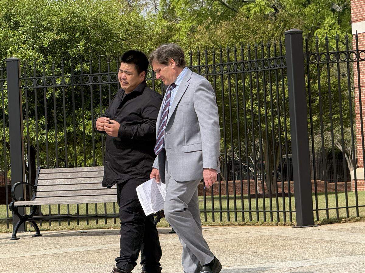 Long Si Lieu, of California and an alleged turtle smuggler, walks from the Columbia federal courthouse on Tuesday, March 31, 2026, with his lawyer, Lowell Bernstein.