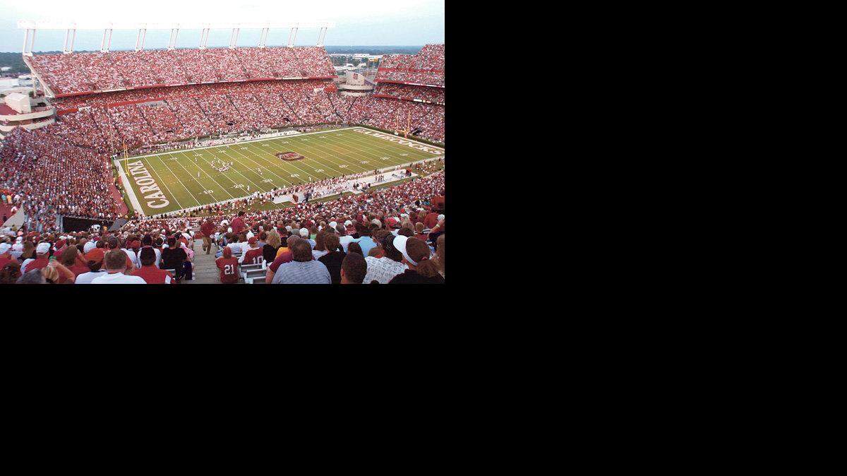09/16/2006 Columbia, S.C., Fans watch the University of South Carolina take   on Wofford College in the upper northwest deck, section 302, at  Williams-Brice Stadium on Saturday evening. (Brett Flashnick/Special to The  State)