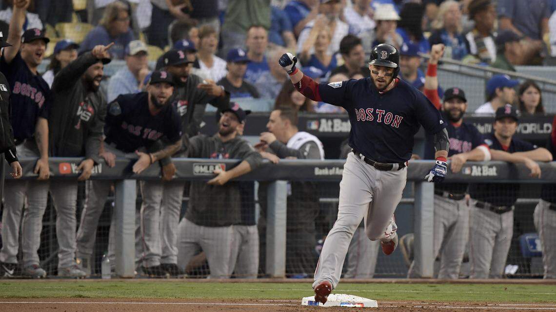 Boston Red Sox’s Steve Pearce celebrates his two-run home run against the Los Angeles Dodgers during the first inning in Game 5 of the World Series baseball game on Sunday, Oct. 28, 2018, in Los Angeles.
