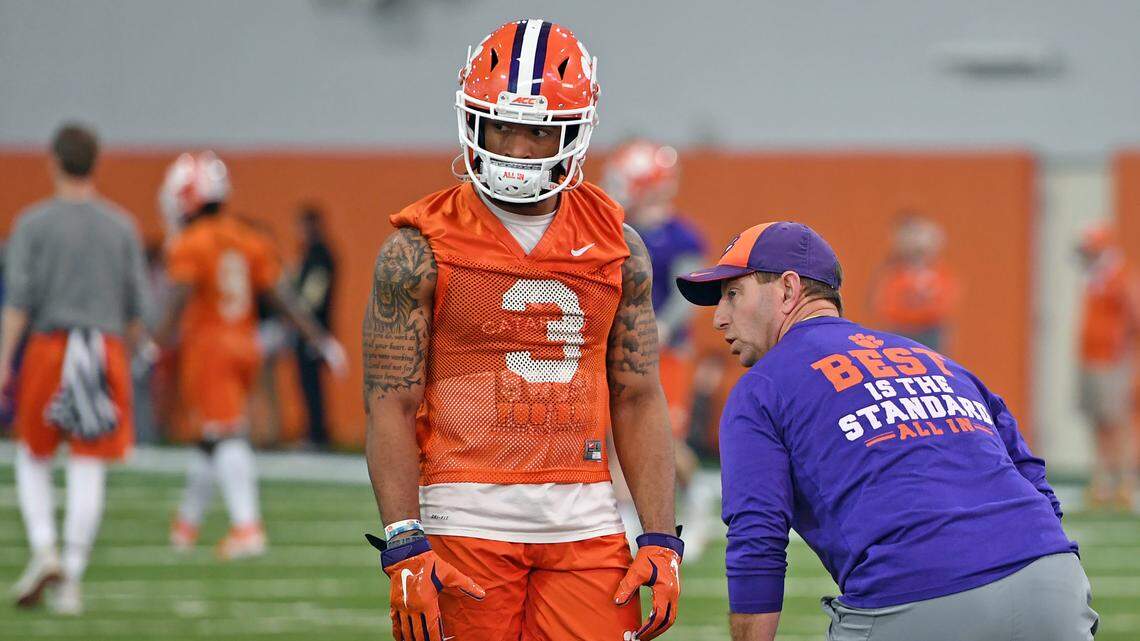 Dabo Swinney works with Clemson wide receiver Amari Rodgers (3). Clemson Spring Football Practice opened Wednesday, February 27, 2019. GWINN DAVIS / FOR THE STATE