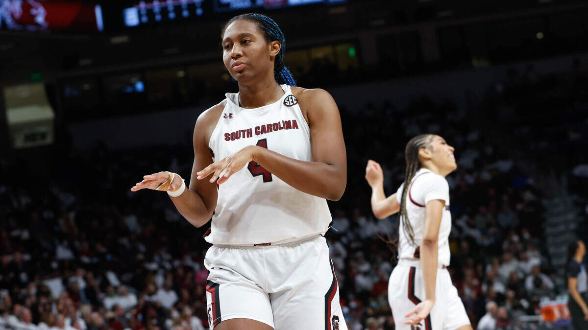 South Carolina’s Aliyah Boston (4) and South Carolina’s Victaria Saxton (5) dance to the music after a time-out during the second half of action against Ole Miss on Thursday, Jan. 27, 2022 in the Colonial Life Arena.