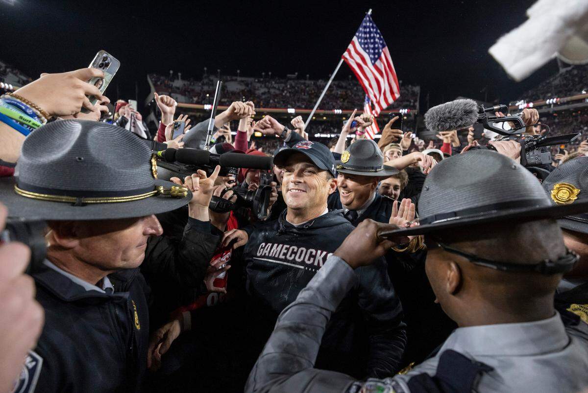 South Carolina Gamecocks head coach Shane Beamer celebrates with fans following his team’s win of Tennessee at Williams-Brice Stadium in Columbia, SC on Saturday, Nov. 19, 2022.