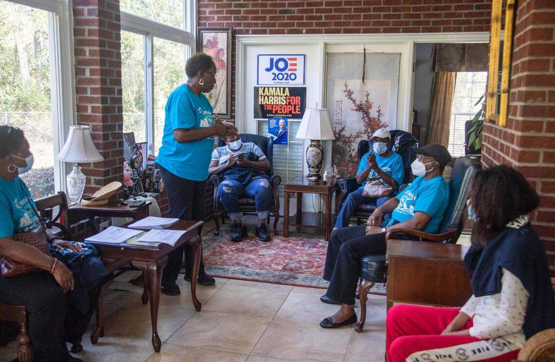 Bernice Scott meets with members of the Reckoning Crew, a group of mostly women activists who support the Democratic Party, to prepare to deliver voting materials in lower Richland County on Tuesday, Oct. 27, 2020. Scott formed the The Reckoning Crew more than 30 years ago to bring needed support to the people in rural Richland County.
