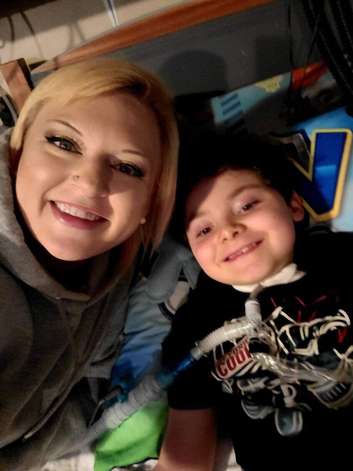 A photo of Ashely Henry of West Columbia and her son, Aiden, who was paralyzed in a car crash when he was 2 years old. Aiden died suddenly in August at age 6.