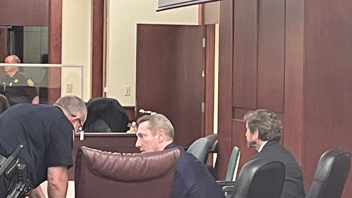 Adam Lazzarini waits to leave a Lexington County court room after he was declared not guilty.