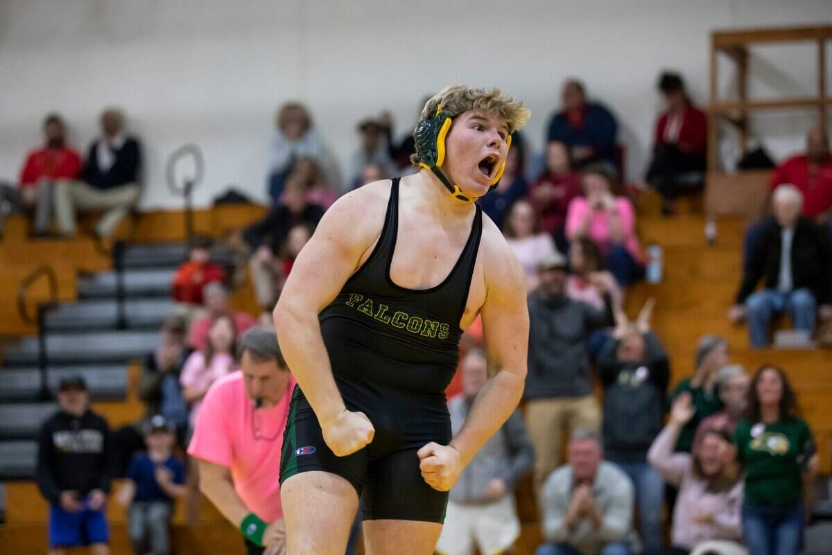 Trey Talbert of Ben Lippen celebrates after pinning Nolan Addeo of the Hammond School in the SCISA 2022 Duals State Wrestling Tournament at Ben Lippen on Saturday, February 5, 2022.