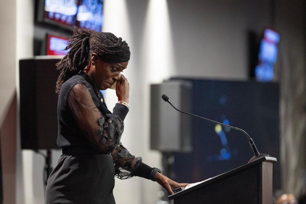 University of South Carolina’s Jocelyn Penn, a former Gamecocks basketball star, wipes tears while thinking of her mother during her induction into the university’s hall of fame at Williams-Brice Arena on Friday, November 1, 2024.