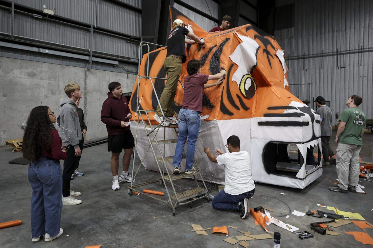 USC engineering students and members of the American Society of Mechanical Engineers (ASME) work on the tiger head while finishing the 30-foot effigy of a Clemson Tiger on Monday, Nov. 17, 2025. The tiger is burned at a pep rally prior to the USC vs Clemson rivalry football game.