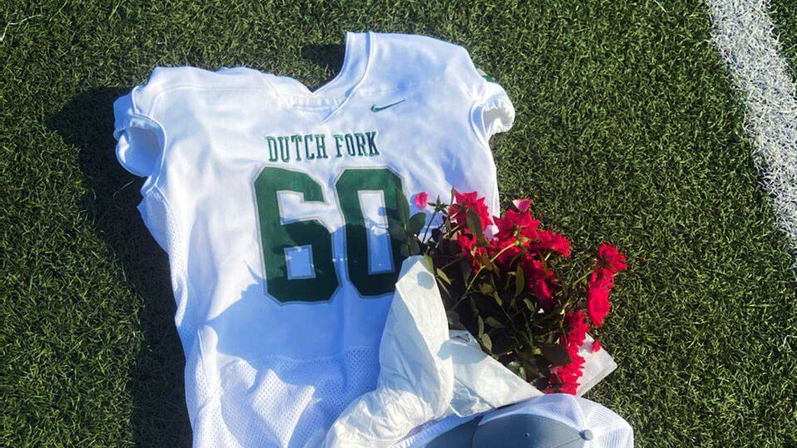 A memorial has been set up on Dutch Fork’s football field honor Silver Foxes’ offensive lineman Jack Alkhatib, who died Tuesday after collapsing at practice.