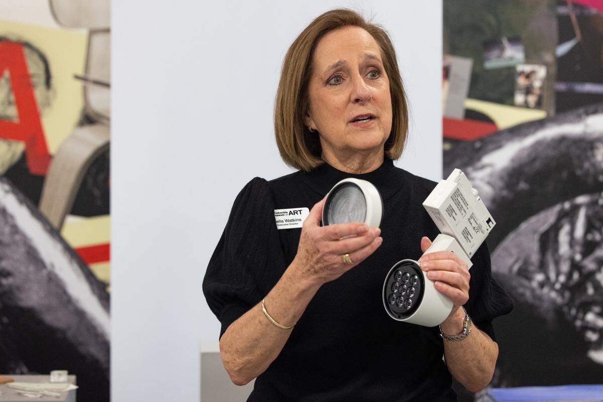Della Watkins, executive director of the Columbia Museum of Art shows the new gallery lighting system at the museum on Friday, February 28, 2025. The ERCO brand lighting produces less heat, which helps protect the art, and has easy to use software to control the lights.