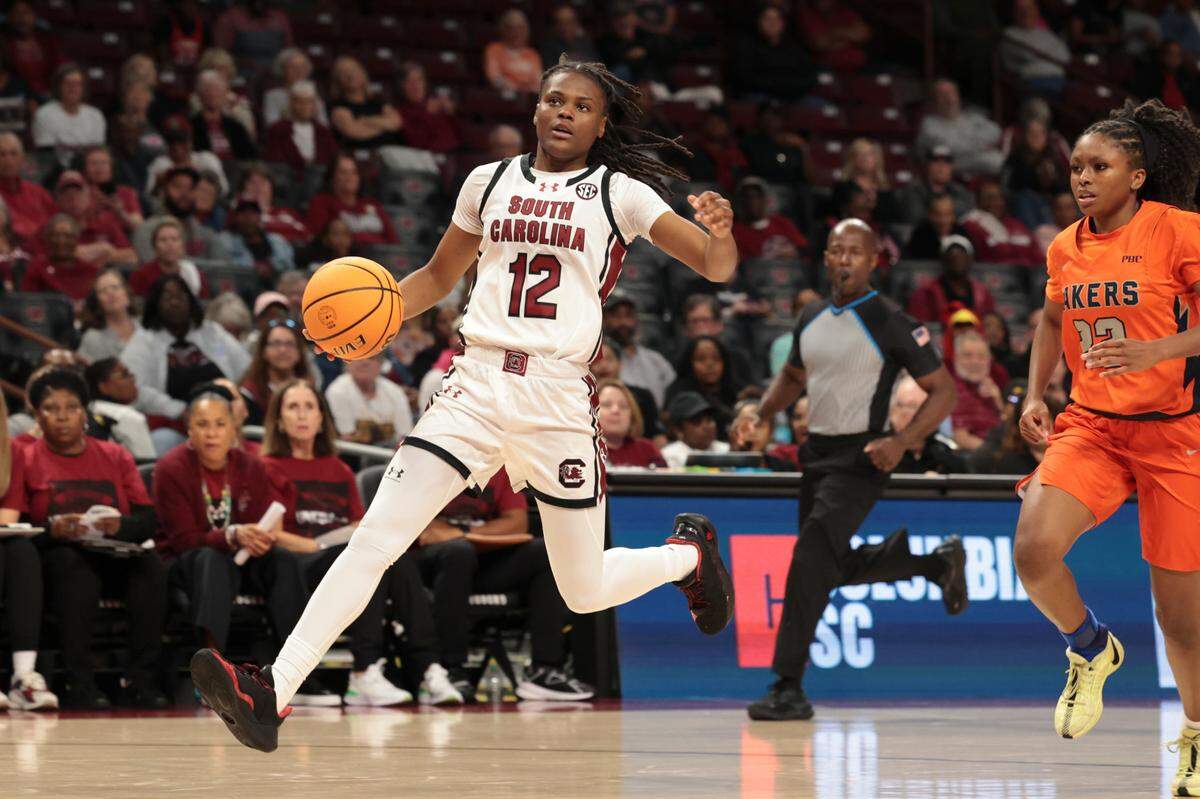 University of South Carolina guard MiLaysia Fulwiley (12) drives down the court as Clayton State’s Armani Shaw (22) during the second half of action in the Colonial Life Arena on Monday, Oct. 28, 2024.