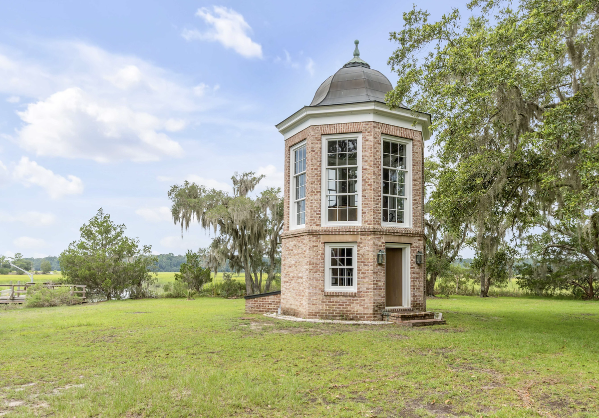 The Lantern, a two-story Jeffersonian building that is reminiscent of a lighthouse., was built by the Fowlers along the marsh as a nod to both fantasy and fact.
