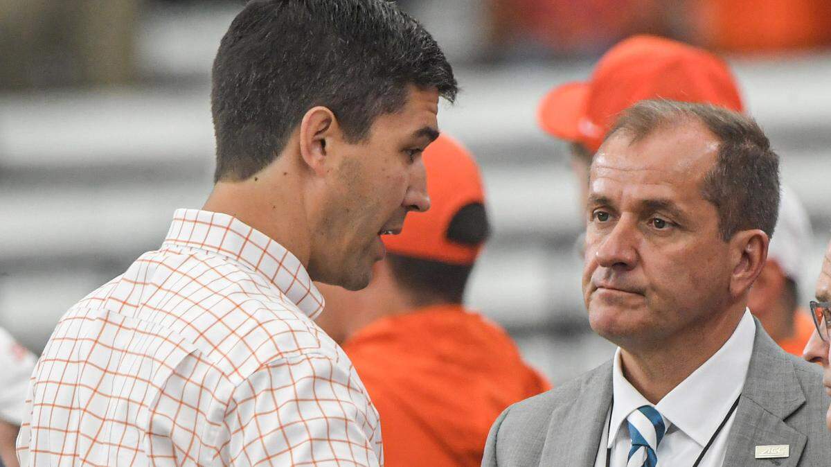 Clemson athletic director Graham Neff (left) and ACC Commissioner Jim Phillips (right) in 2023