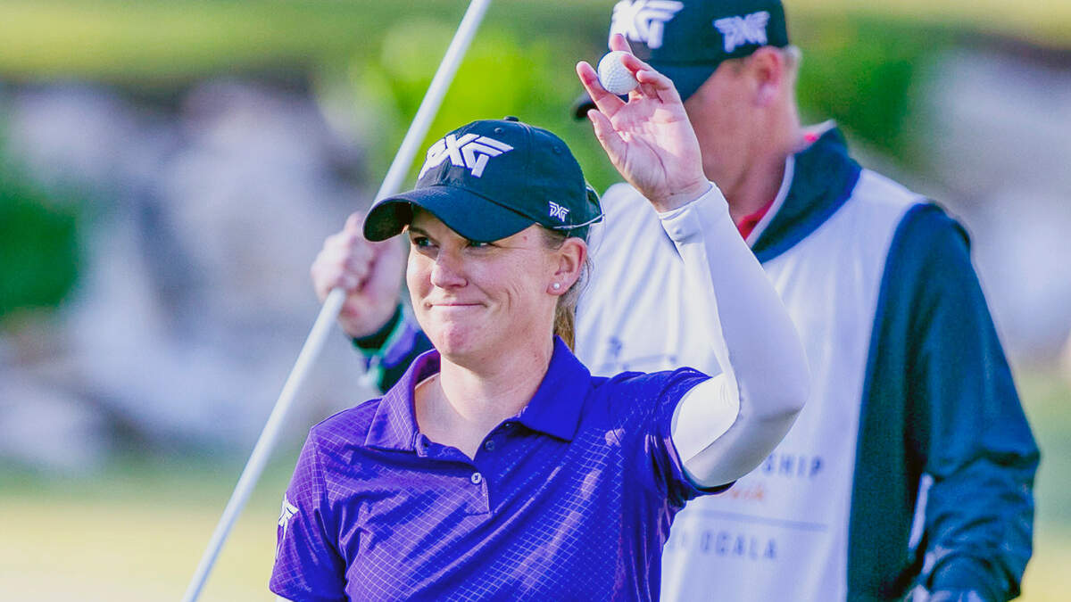 CORRECTS TO AUSTIN ERNST NOT AUSTIN ERNSTS - Austin Ernst celebrates her win with her fiancé Jason Dods during the final round of the LPGA golf tournament in Ocala, Fla., Sunday, March 7, 2021. (Alan Youngblood/Ocala Star-Banner via AP)
