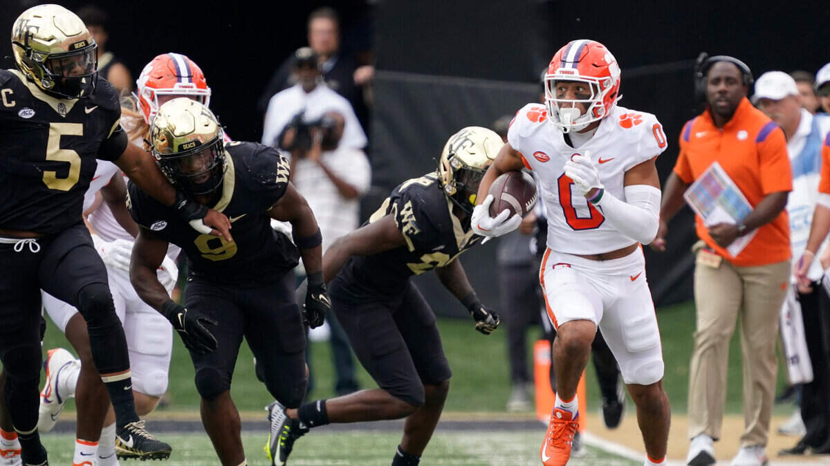 Clemson wide receiver Antonio Williams (0) runs for a long gain against Wake Forest during the second half of an NCAA college football game in Winston-Salem, N.C., Saturday, Sept. 24, 2022. (AP Photo/Chuck Burton)