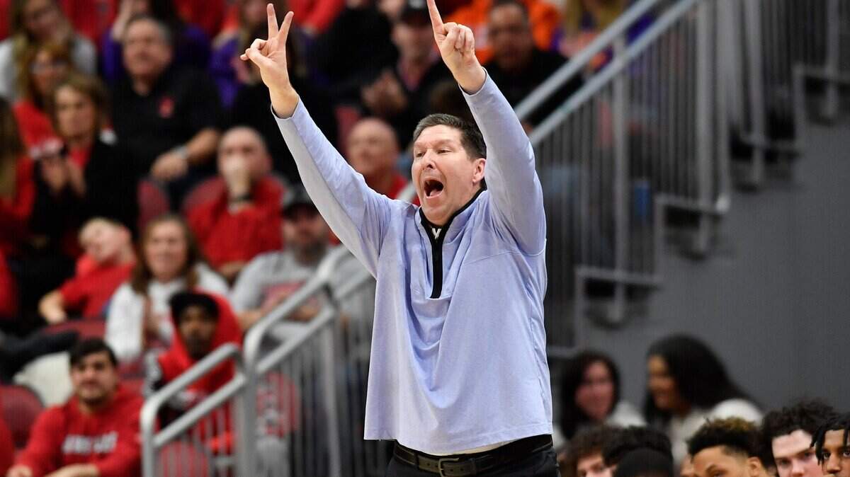 Clemson coach Brad Brownell shouts instructions to the team during the second half of an NCAA college basketball game against Louisville in Louisville, Ky., Saturday, Feb. 18, 2023. (AP Photo/Timothy D. Easley)