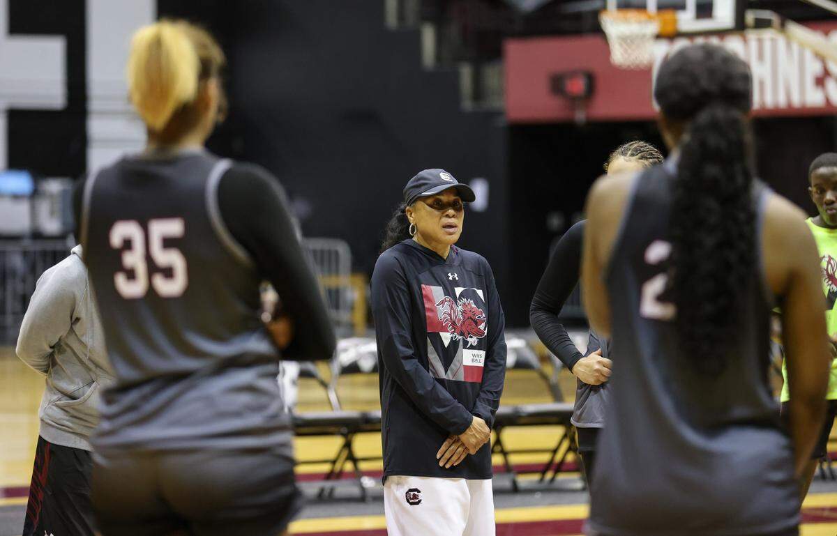South Carolina head coach Dawn Staley speaks with her players during practice at Carolina Coliseum in Columbia on Thursday, September 28, 2023.