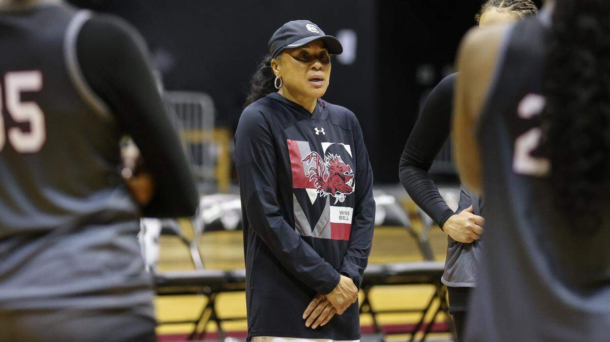 South Carolina head coach Dawn Staley speaks with her players during practice at Carolina Coliseum in Columbia on Thursday, September 28, 2023.