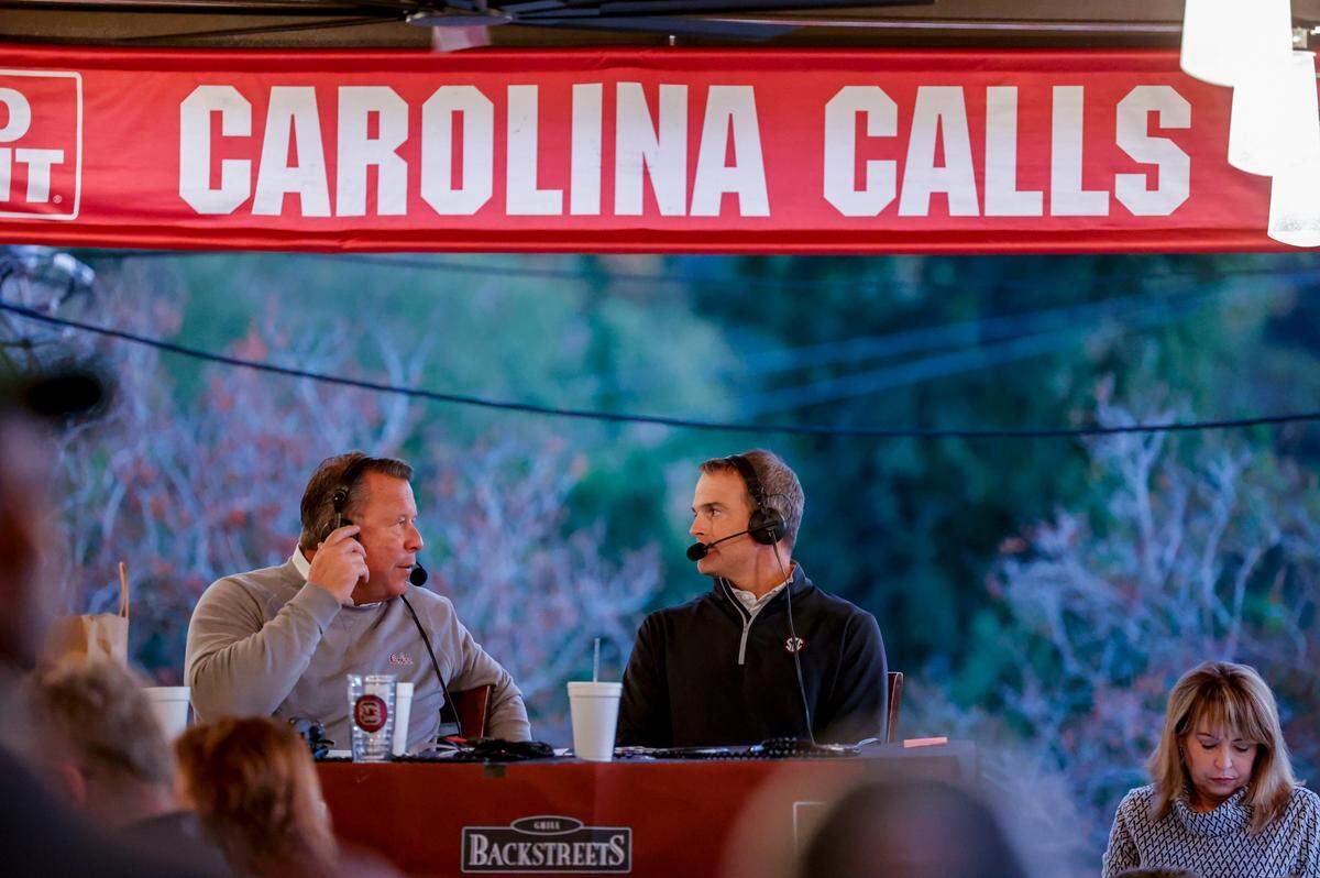 University of South Carolina football coach Shane Beamer and talk-show host Todd Ellis participate in The Carolina Calls Show live at Backstreets Grill in Columbia on Thursday Oct. 27, 2022.