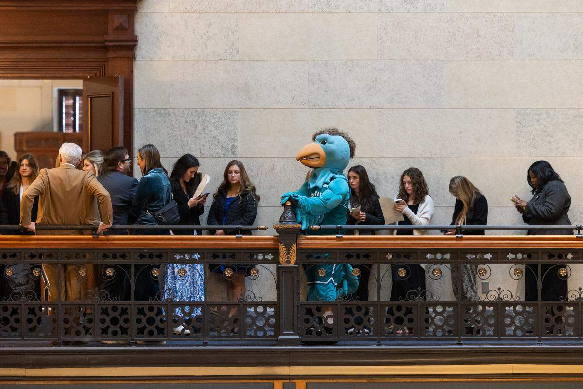 Coastal Carolina University mascot Chauncey the Chanticleer stands in line to enter the South Carolina State House balcony on Tuesday, February 24, 2026.