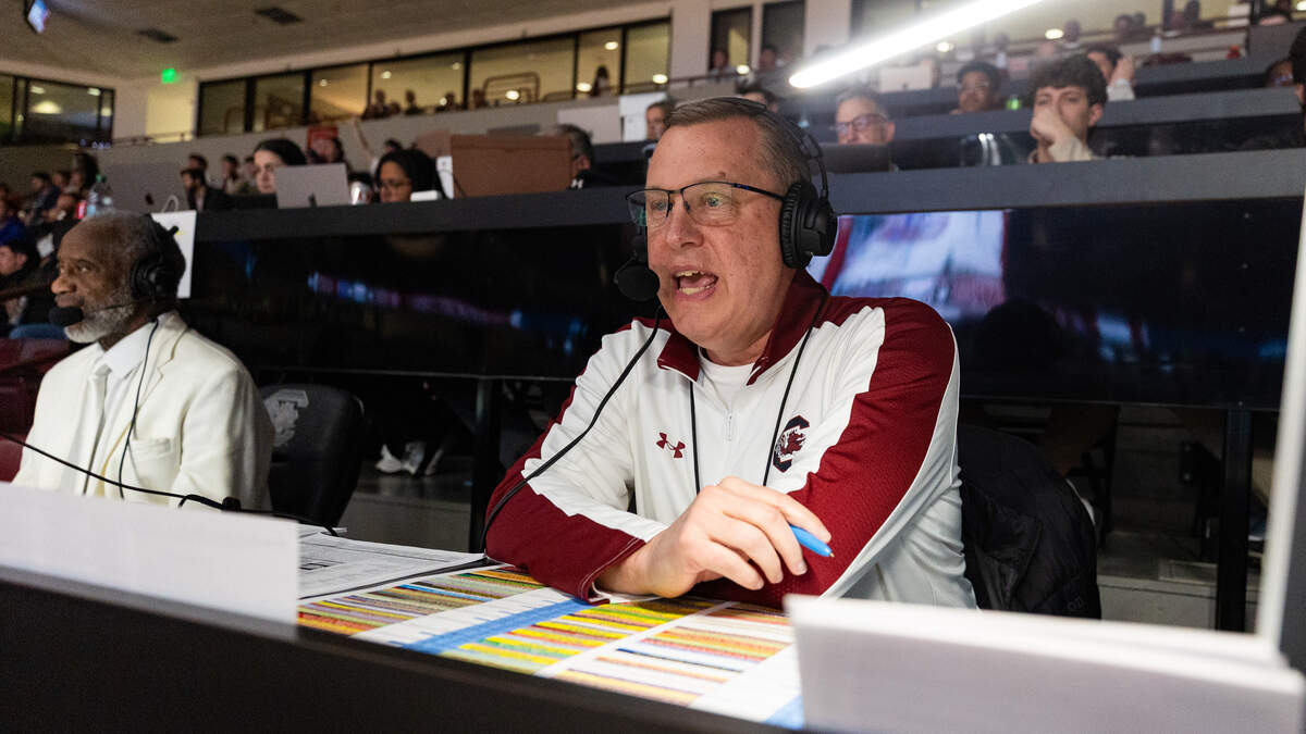 Casey Manning and Derek Scott sit with reporters in Colonial Life Arena on Wednesday, January 28, 2026.