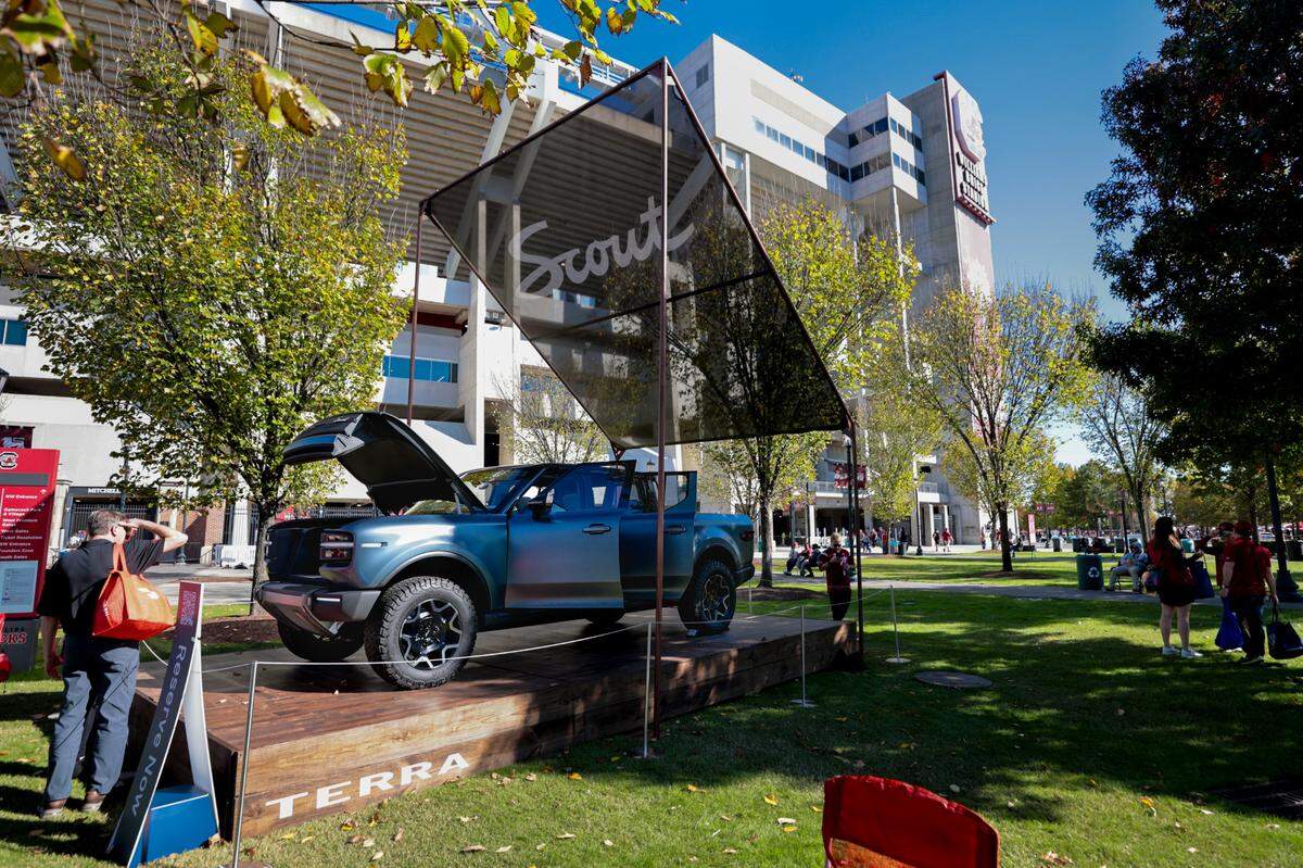People look at the new Terra truck by Scout Motors. The concept cars were on display at Williams-Brice Stadium before USC’s game against Missouri on Saturday, Nov. 16, 2024.