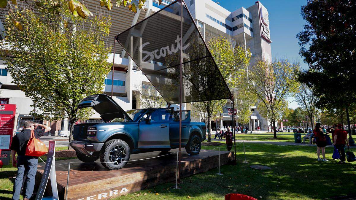 People look at the new Terra truck by Scout Motors. The concept cars were on display at Williams-Brice Stadium before USC’s game against Missouri on Saturday, Nov. 16, 2024.