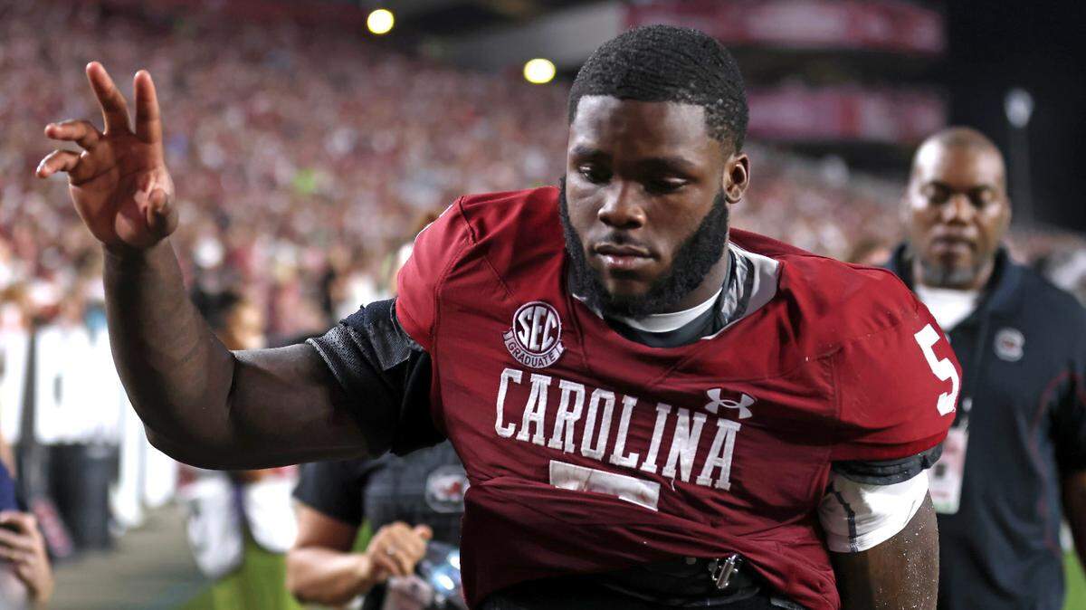 Rocket Sanders heads to the locker room late in the first half of Saturday’s game.