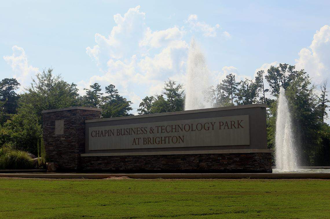 Fountains run behind the sign at the vacant Chapin Business & Technology Park at Brighton. July 9, 2024