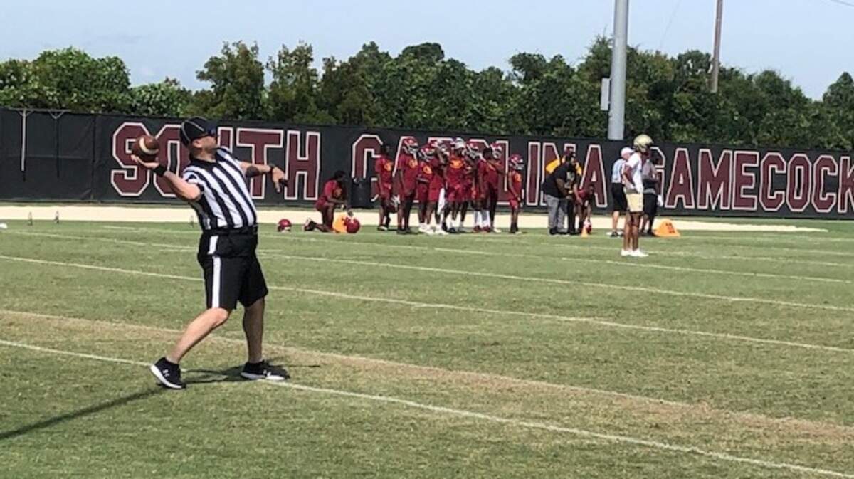 Dan Boothe throws an errant pass back to his crewmate during South Carolina’s 7-on-7 tournament at the Gamecocks practice facility.