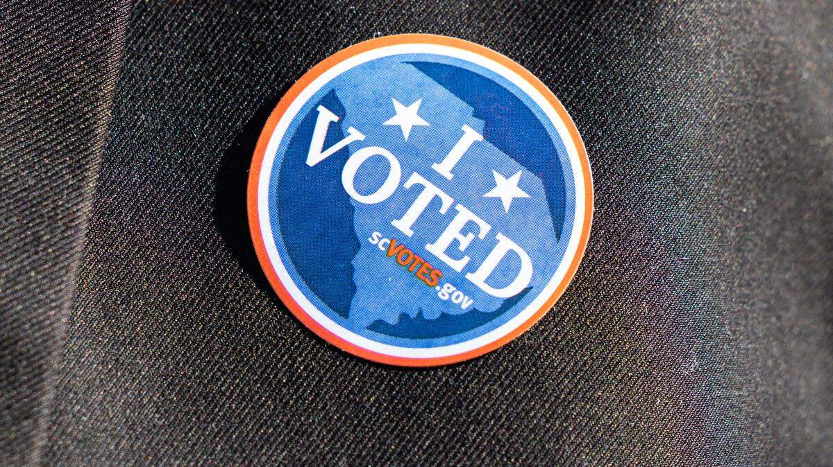 An “I Voted” sticker is shown in 2024.