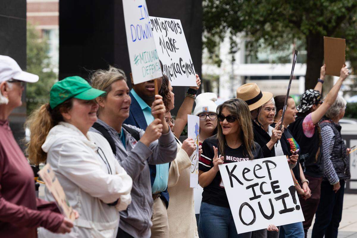 Protestors demand ICE leaves their office at 1441 Main Street in downtown Columbia, South Carolina on Thursday, February 19, 2026. ICE leased office space in downtown Columbia without discussion with local law enforcement or elected officials.
