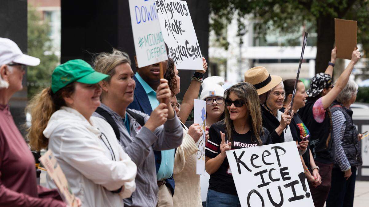 Protestors demand ICE leaves their office at 1441 Main Street in downtown Columbia, South Carolina on Thursday, February 19, 2026. ICE leased office space in downtown Columbia without discussion with local law enforcement or elected officials.