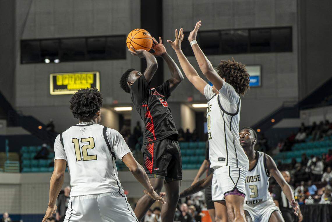 Westwood Demarcus Thomas (5) shoots the ball over a defender in the second half at the SCHSL Lower State Championship game of Goose Creek vs Westwood Friday, Feb. 27, 2026, in Florence, S.C.
