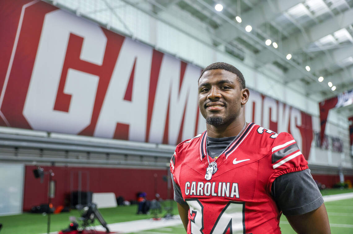 Jamian Risher cheering from the stands of South Carolina Gamecocks stadium