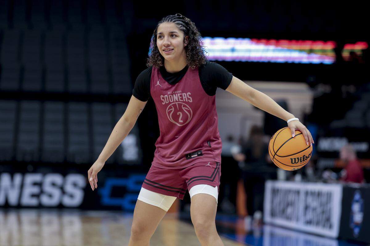 Oklahoma's Aaliyah Chavez warms up during the Sooners’ practice on March 27, a day before their NCAA Tournament Sweet 16 game against South Carolina in Sacramento, Calif.